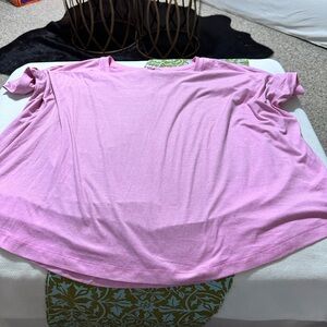Soft pink tshirt with rounded bottom